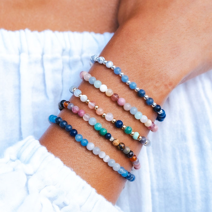 Compassion Healing 4mm Bracelet, stacked on the forearm