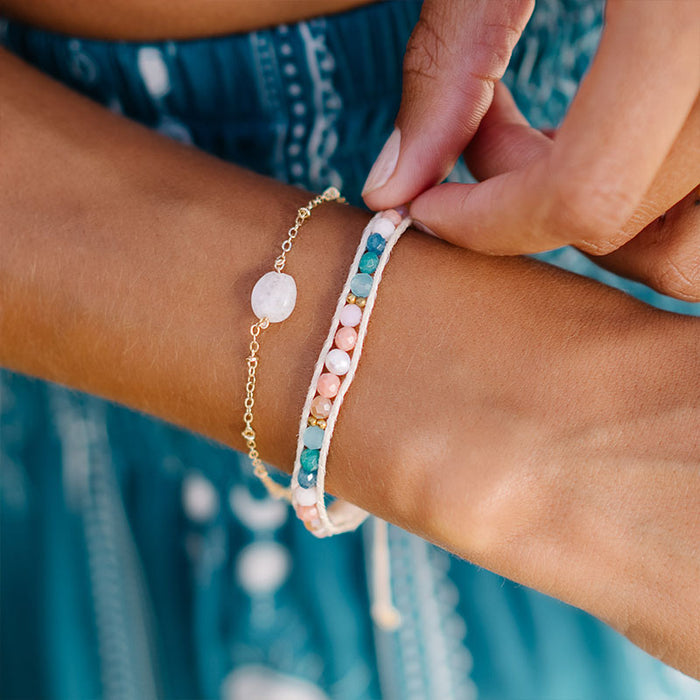 Coral Kiss Healing Bracelet, on wrist