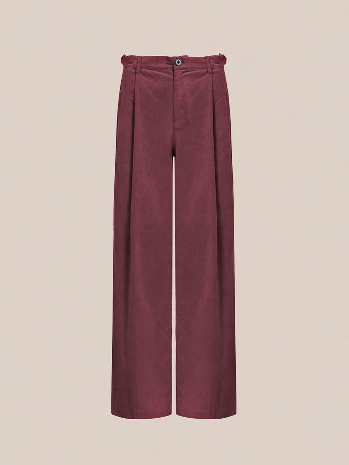 FOUND Corduroy Pleated Trousers in maroon, designed with a high waist, wide-leg silhouette, front pleats, and button closure, showcased against a plain beige background.