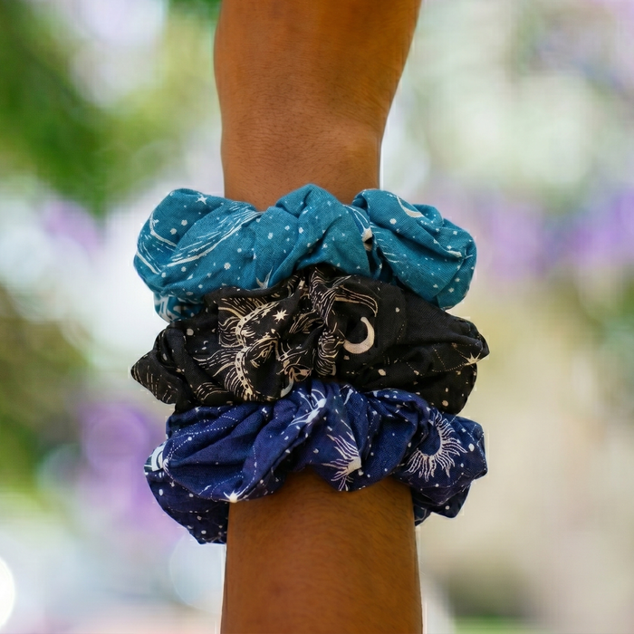 Cosmic Sky Scrunchie Pack of 3, stacked on wrist