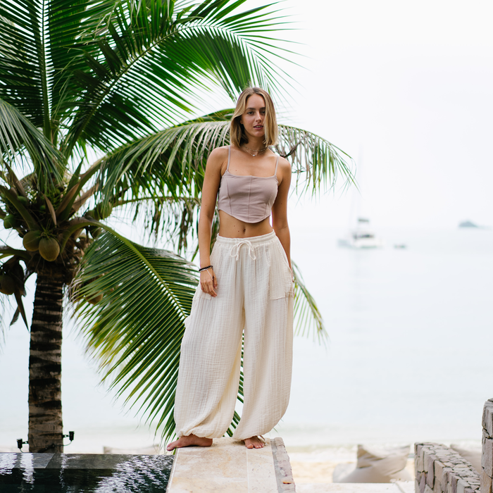 Cream Adventure Cargo Pants, worn poolside