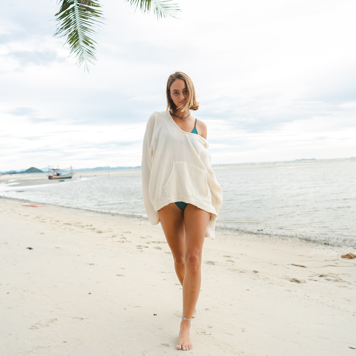 Cream Baja Pullover, worn on the beach