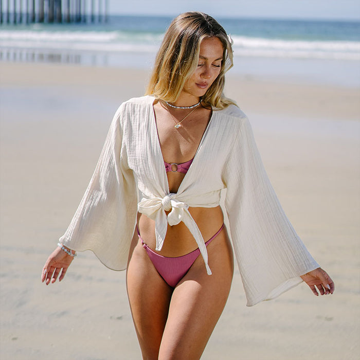 Cream Cotton Daydreamer Top, worn walking the beach