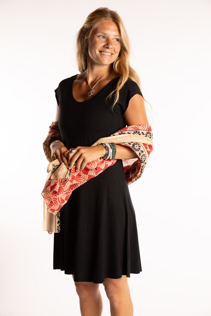 Sophie is wearing the Kala Cotton Sarong in Red