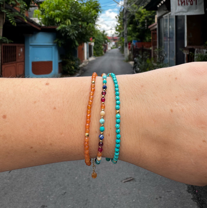 Divine Healer 3mm Healing Bracelet, stacked on wrist