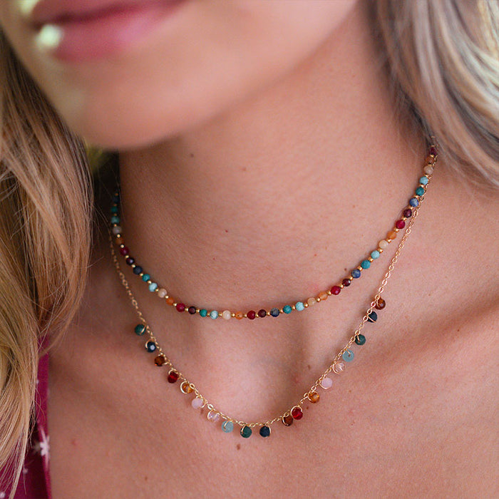 Divine Healer 3mm Healing Necklace, worn layered with charm necklace