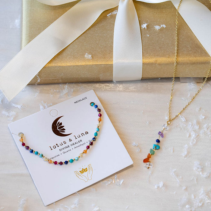 Divine Healer + 7 Chakra Raw Stone Necklace Stack, flat lay with gift box