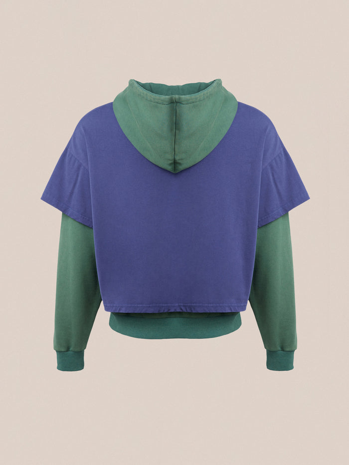 The back view of a blue and green Found double layer hoodie.