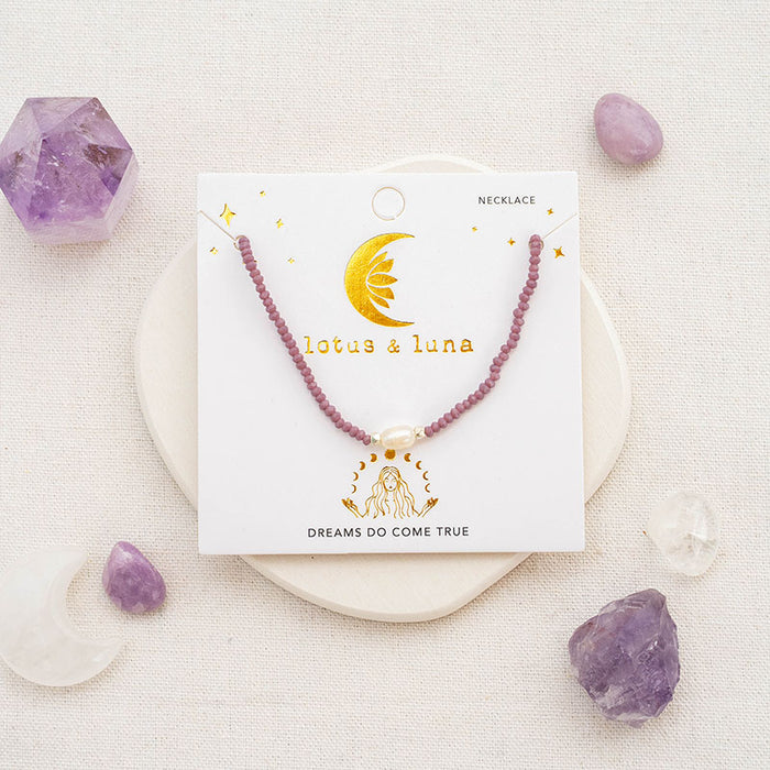 "Dreams Do Come True" Goddess Necklace, flat lay on card