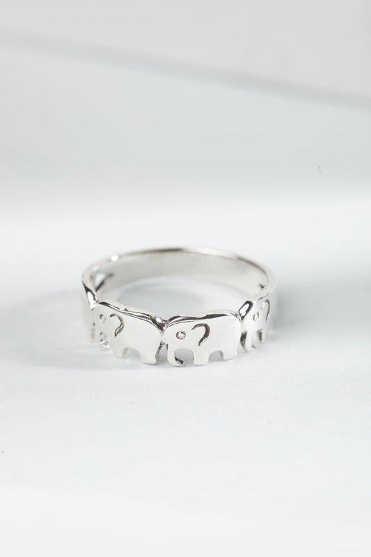 sterling silver elephant parade ring with elephant band design