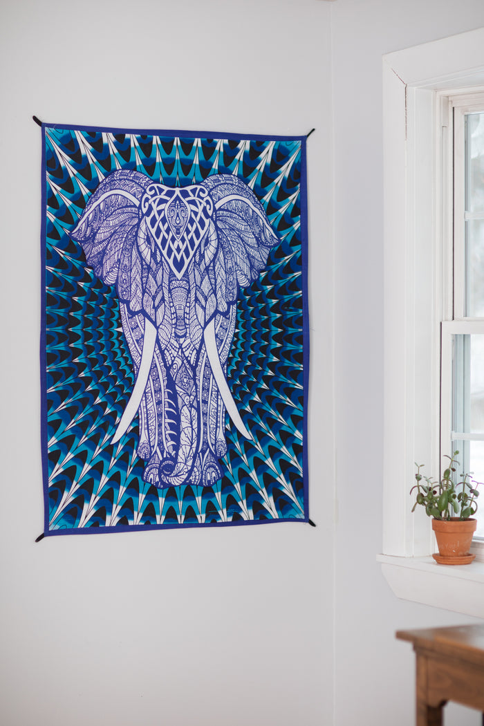 blue elephant wall hanging tapestry with intricate elephant design and geometric pattern