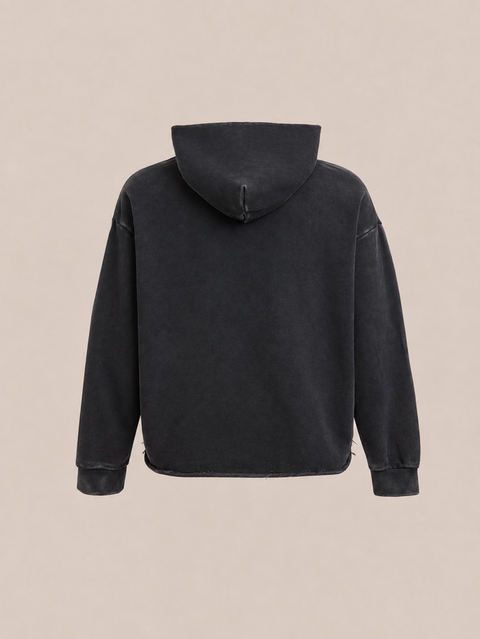 The FOUND Embroidered Wildlife Hoodie is shown from the back, featuring long sleeves and a relaxed fit, crafted from vintage French-terry cotton and displayed against a plain beige background.