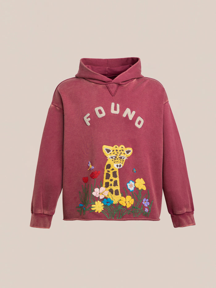 The FOUND Embroidered Wildlife Hoodie is a maroon vintage French-terry cotton hoodie featuring "FOUND," an embroidered giraffe, flowers, and butterflies on the front.