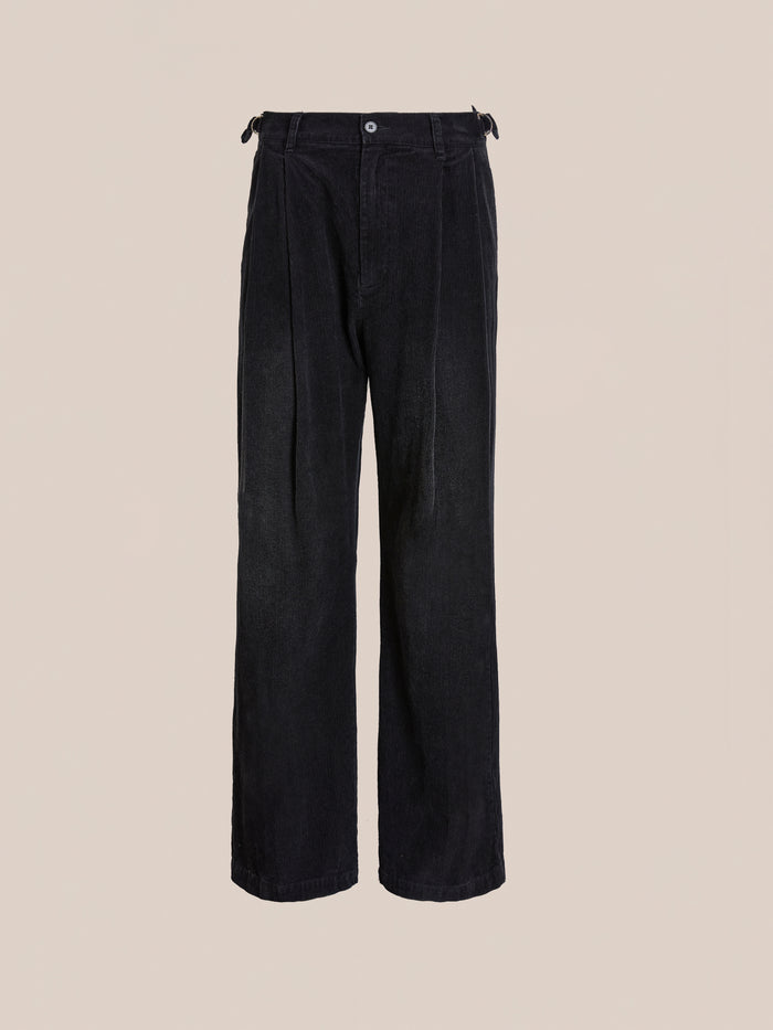 The FOUND Faded Pleated Corduroy Pants feature a high waist, wide legs, double pleats, and a button closure, shown against a plain beige background.