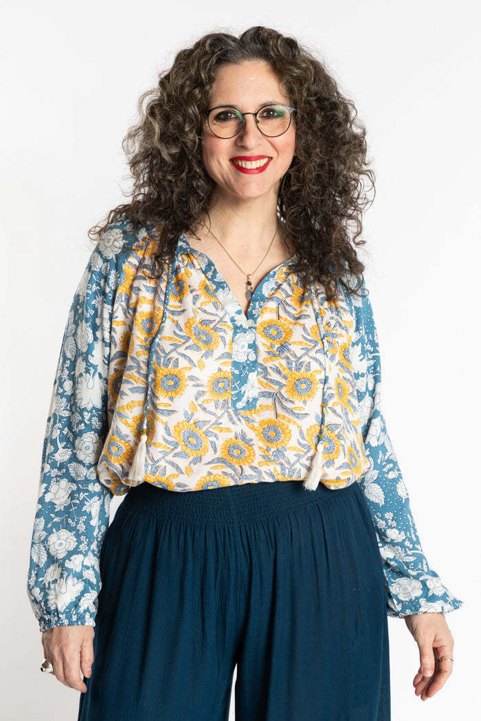Susan is wearing the mixed print Sunflower boho floral poet blouse top