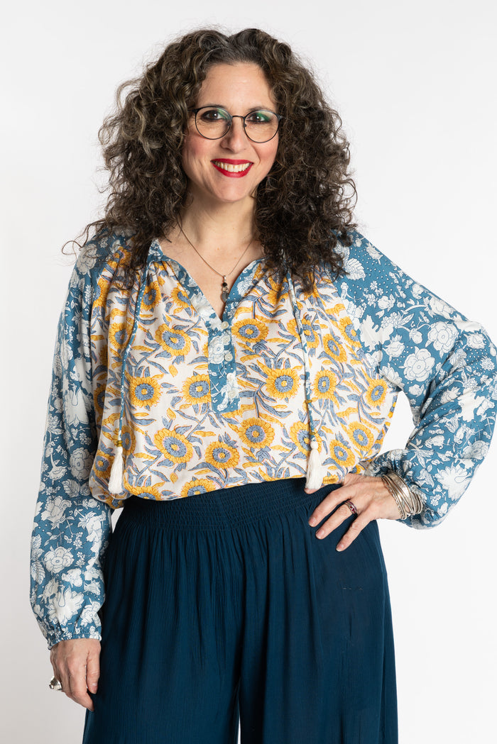 Susan is wearing the mixed print Sunflower boho floral poet blouse top