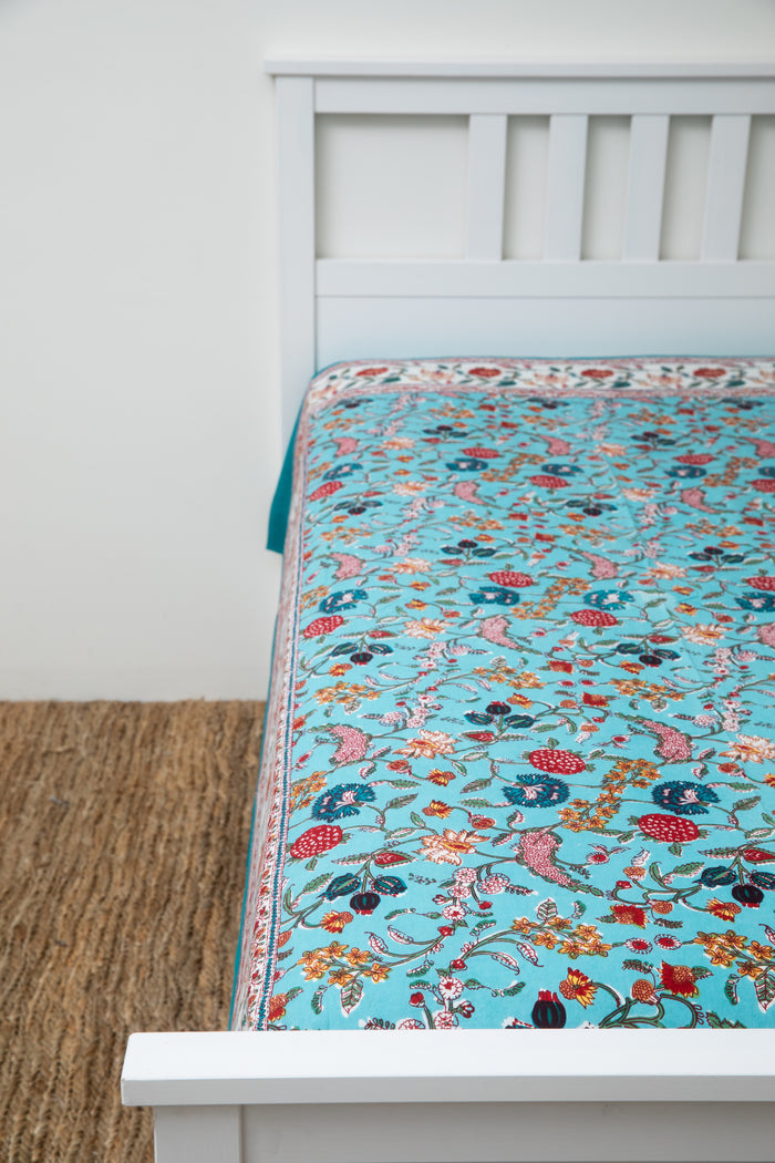 Block print floral tapestry in turquoise