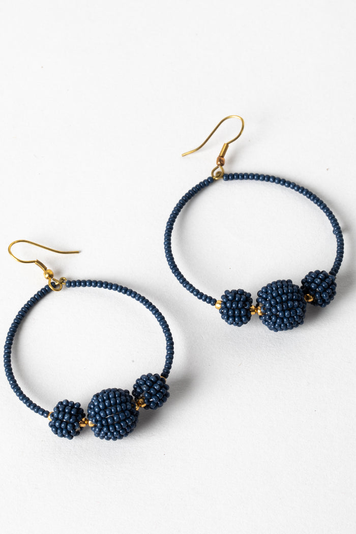 blue seed bead hoop earrings with trilogy bead accents