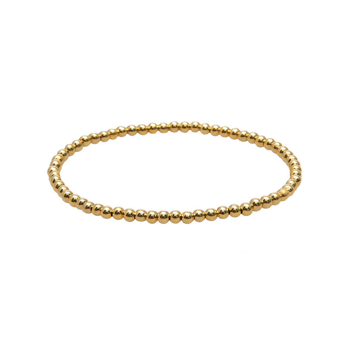 Gold 3mm Stretch Bead Bracelet, flat lay
