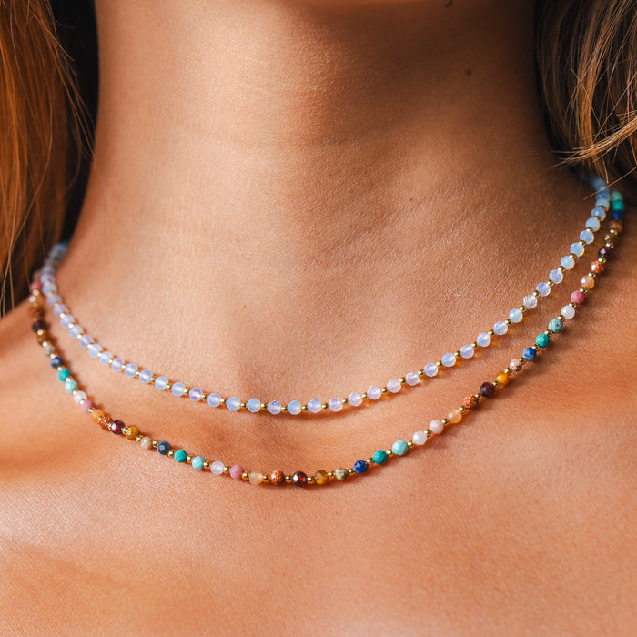 Gold Moon Dancer 3mm Healing Necklace, worn layered with beaded necklace