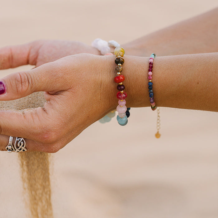 Good Vibes 3mm Healing Bracelet, worn on the beach