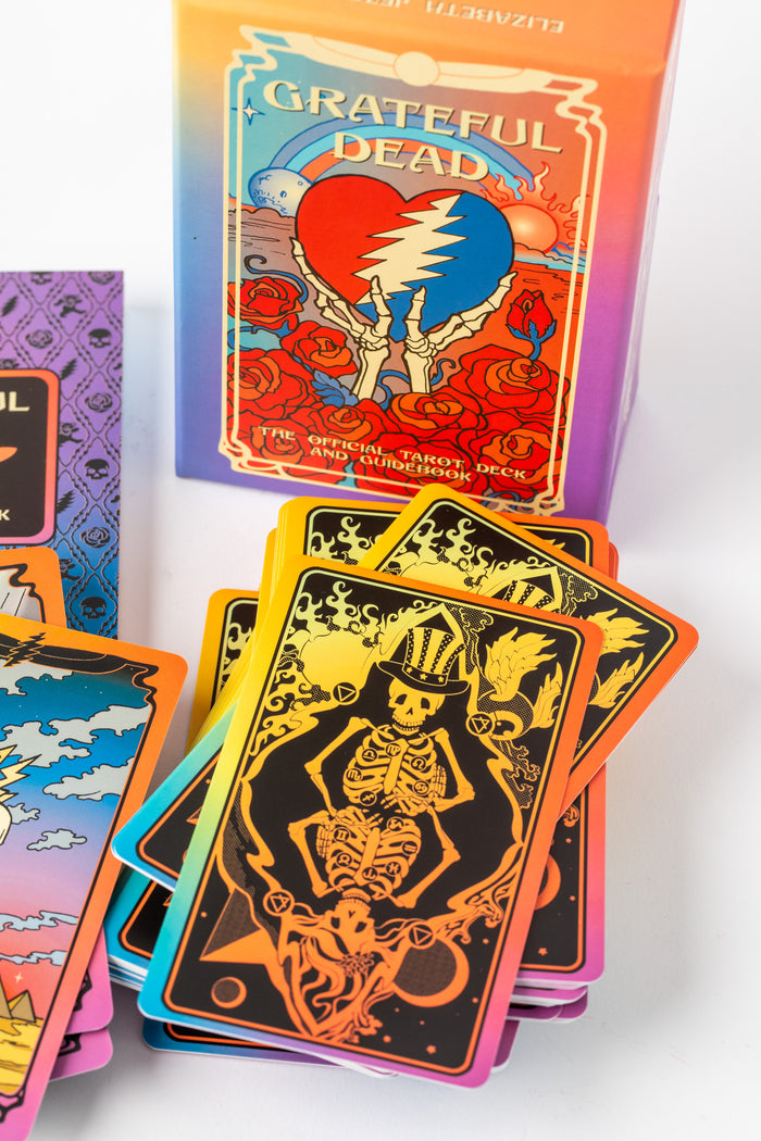 Official Grateful Dead Tarot Deck spread with cards and box showing vibrant psychedelic design.