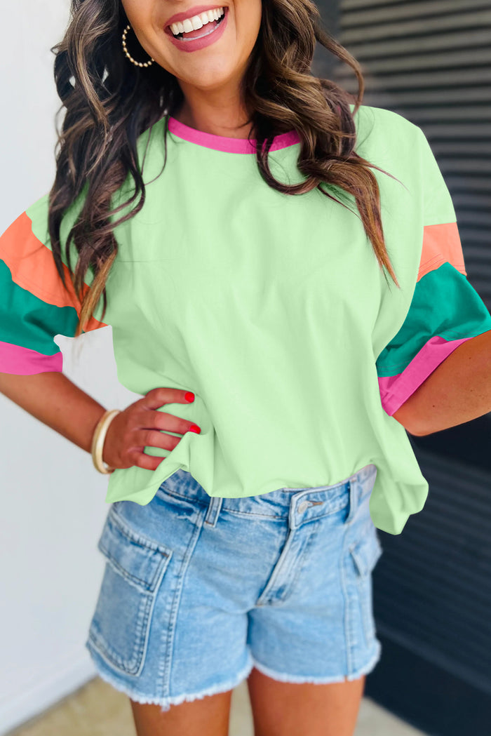 Haut oversize vert à manches et col rond avec coutures contrastées