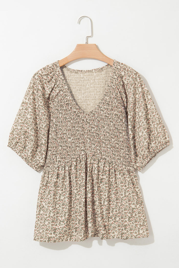 Haut smocké à manches bouffantes et imprimé floral