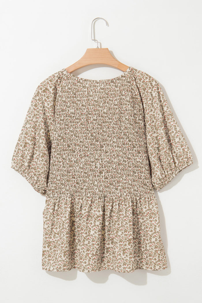 Haut smocké à manches bouffantes et imprimé floral