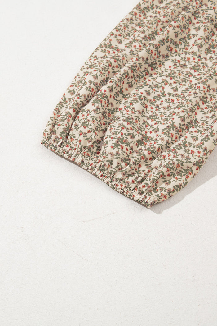 Haut smocké à manches bouffantes et imprimé floral