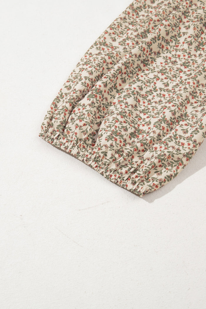 Haut smocké à manches bouffantes et imprimé floral