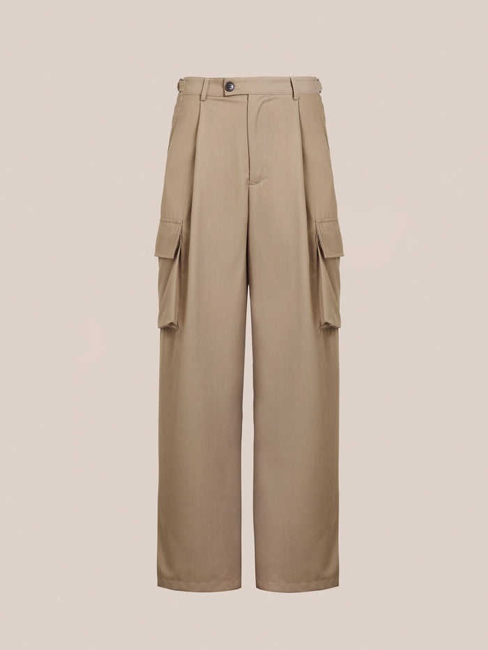 FOUND's Hava Pleated Cargo Trousers offer a utilitarian style with beige wide-legs, button and zip closure, large side pockets, and an adjustable waistband.