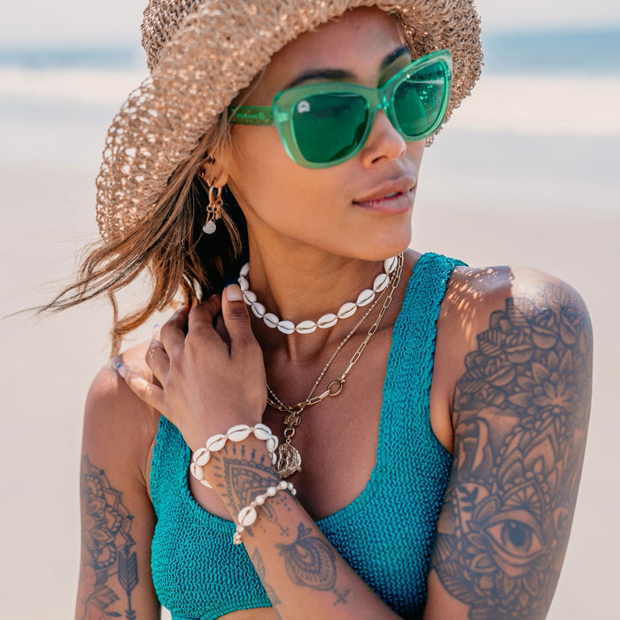 Hemp Cowry Shell Necklace, worn on the beach