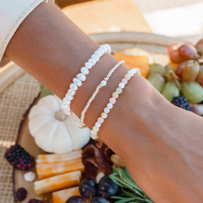 "I Love and Accept Myself as I am" Goddess Bracelet, worn on wrist with charcuterie