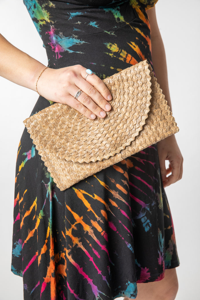Woven clutch in sand