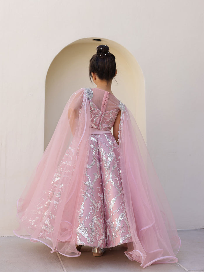 Paired with matching potli bag for luxury look.