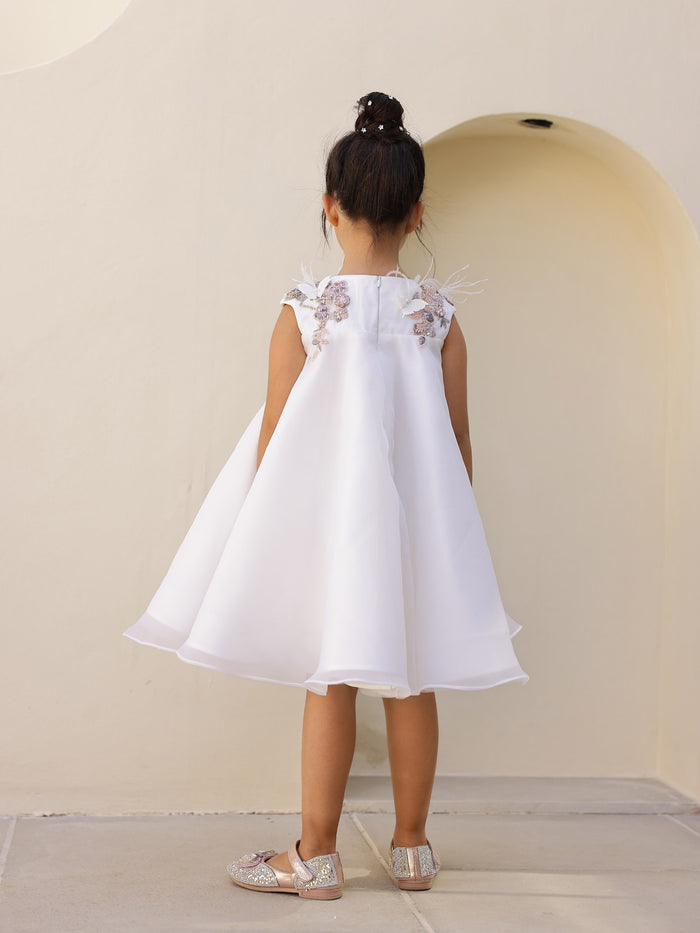 Back view of white twirl-ready children‰۪s party dress