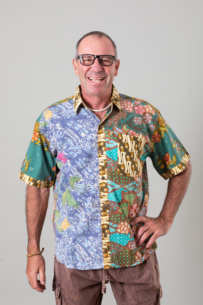 Ross is wearing the size L Patchwork button down shirt