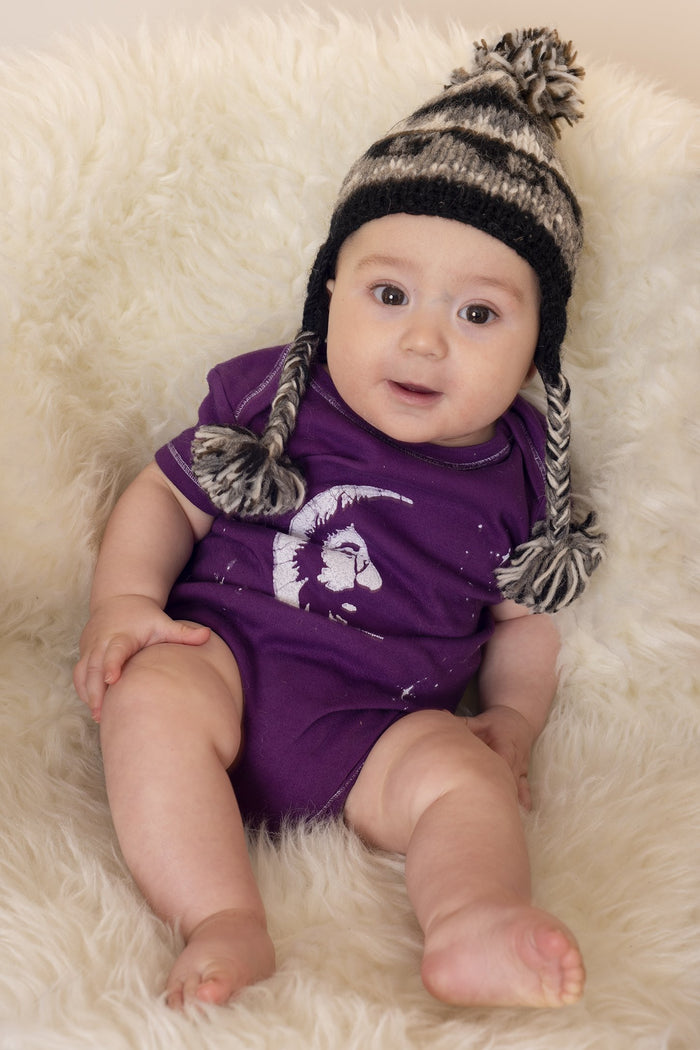 Marley is wearing a Jerry Garcia baby one piece