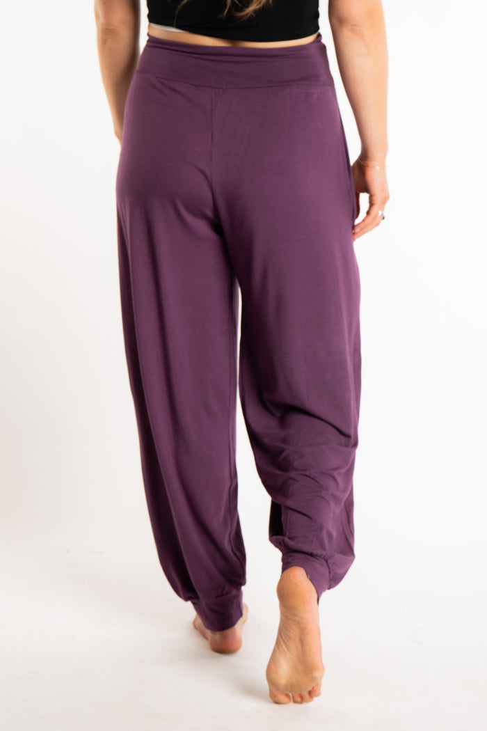 Sophie is wearing size S/M Solid Color Boho Pants in Amethyst