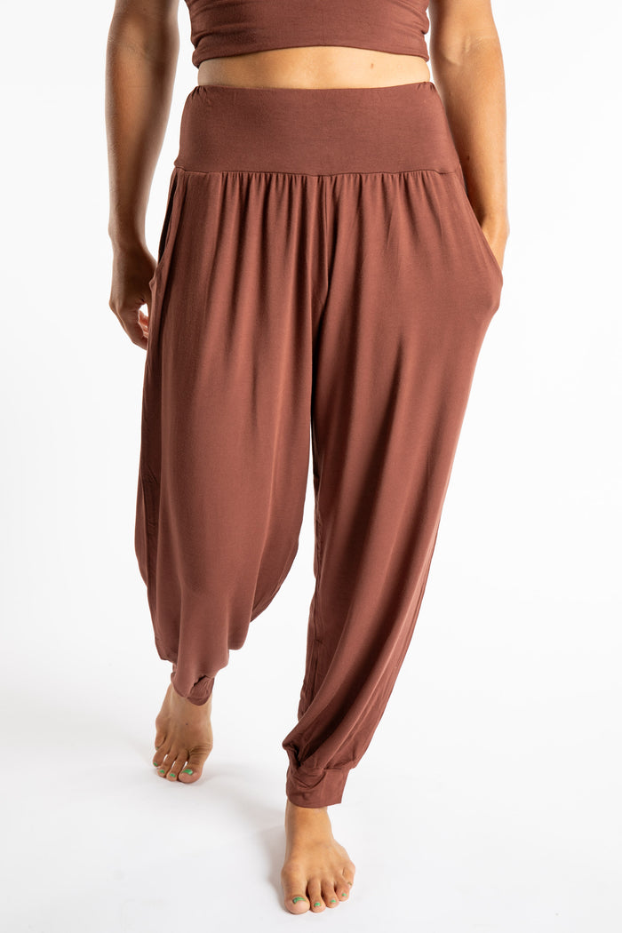 Sophie is wearing the Jum Jum Tapered Joggers in Brown in S/M