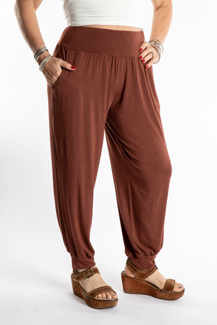 Sophie is wearing the Jum Jum Tapered Joggers in Brown in S/M