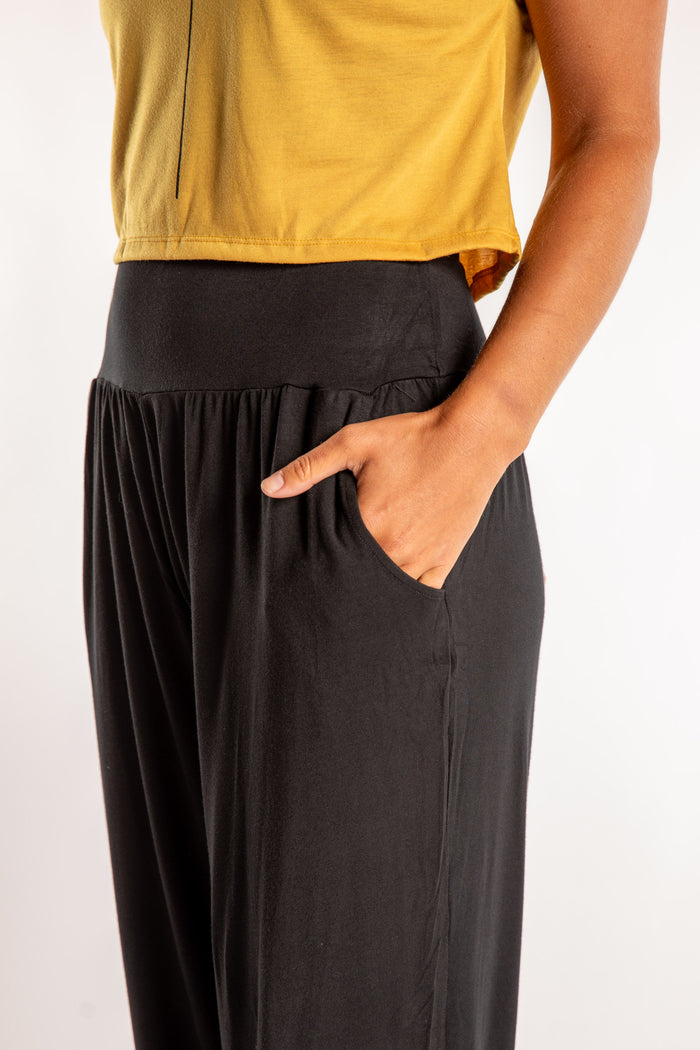 Sophie is wearing the Jum Jum Tapered Joggers in Black in S/M