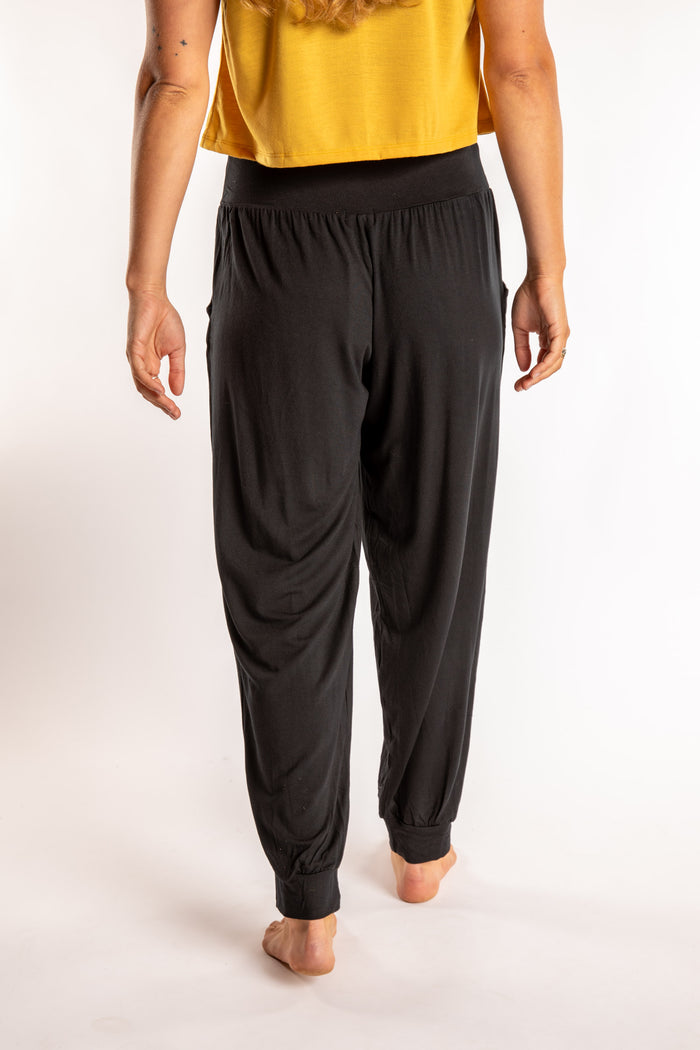 Sophie is wearing the Jum Jum Tapered Joggers in Black in S/M