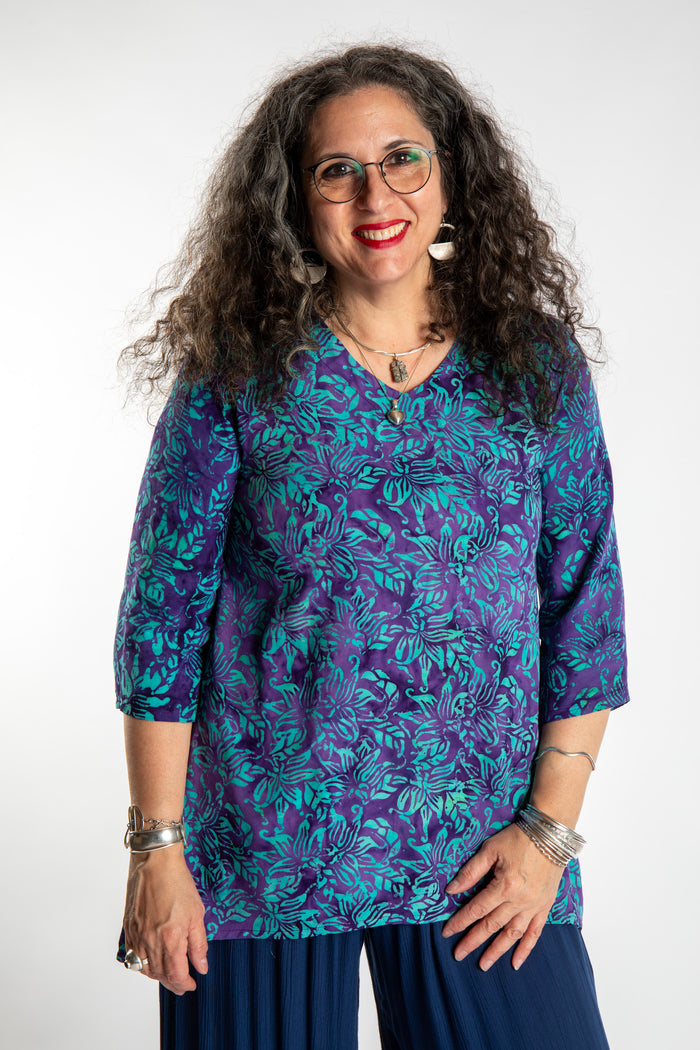 Susan wearing the M/L Blue Violet floral batik tunic top