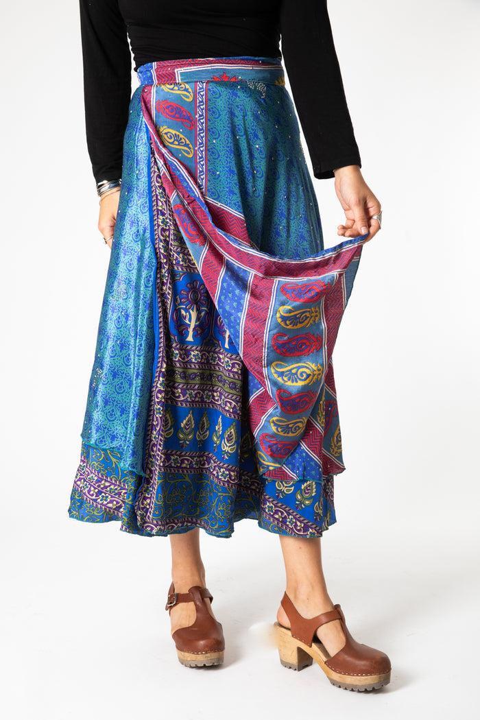 Sophie is wearing sari silk wrap skirt in morning dew