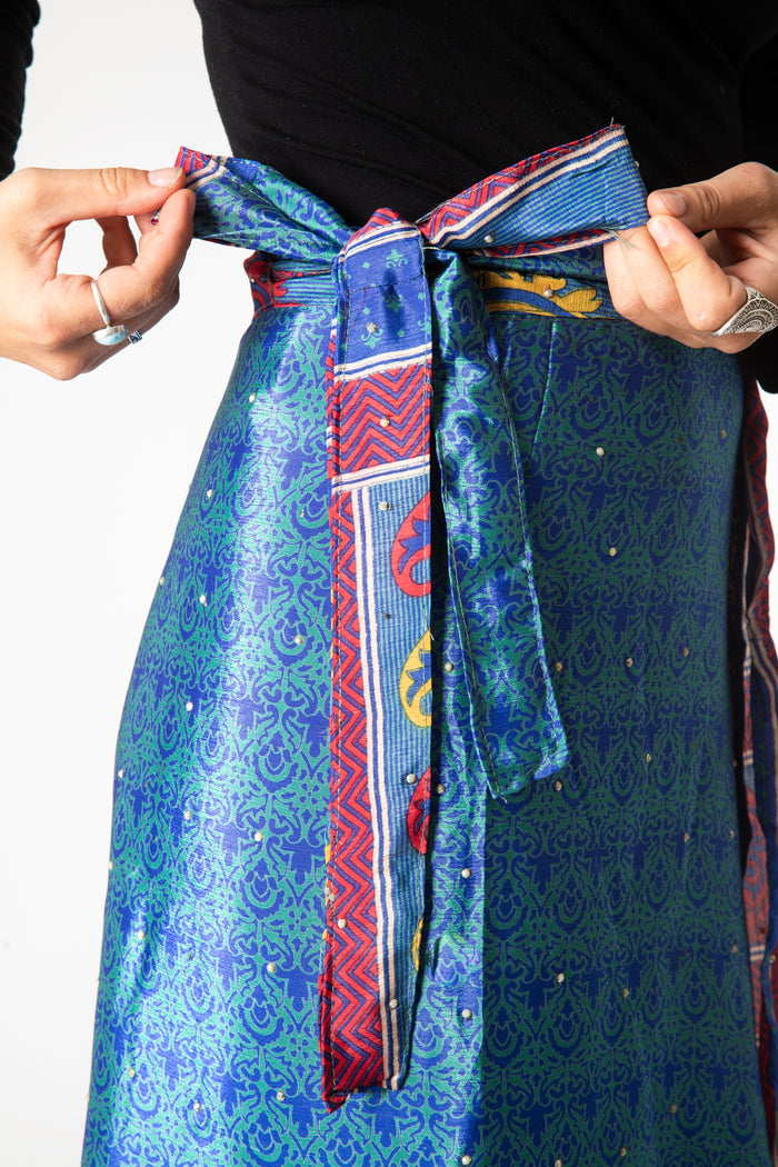Sophie is wearing sari silk wrap skirt in morning dew