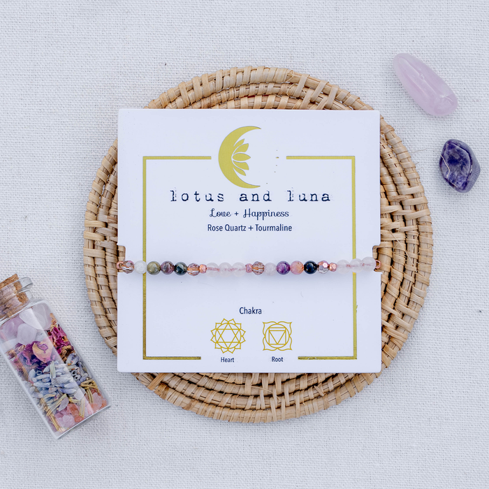 Love + Happiness 4mm Healing Bracelet, on card on rattan