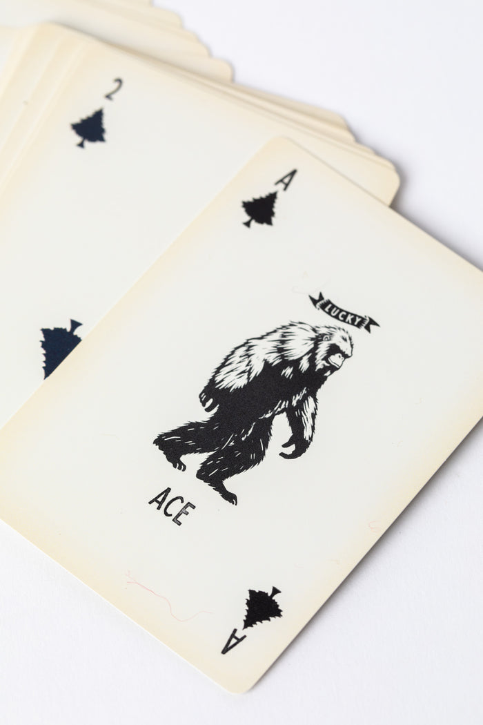 Lucky Camper Waterproof Playing Cards displaying Bigfoot card