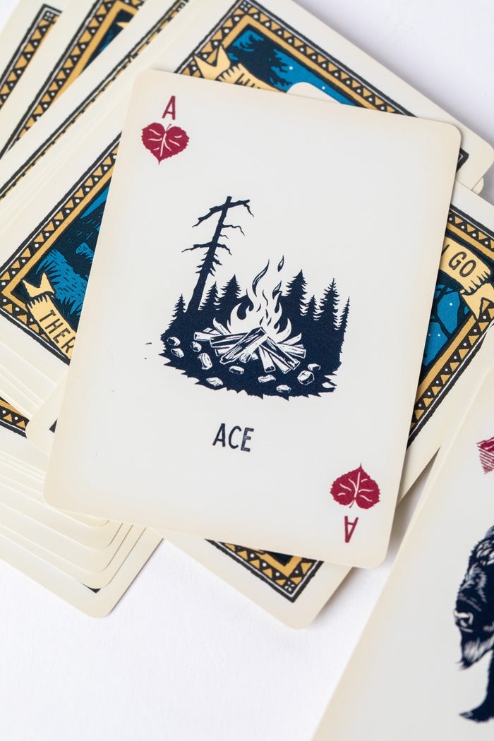 Lucky Camper Waterproof Playing Cards displaying campfire card